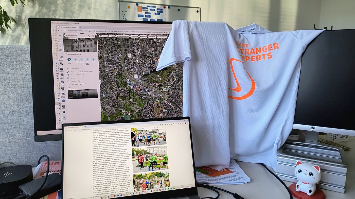 Laufshirt am Konstruktionsarbeitsplatz mit CAD-Bildschirmen